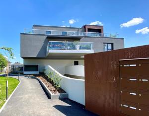 Appartements Appartement avec terrasse, jardin et double garage : photos des chambres