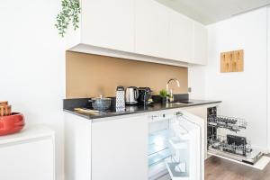 Appartements Yuna Les Halles - Serviced Apartments : photos des chambres