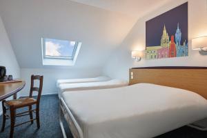 Hotels Kyriad Tarbes Bastillac : photos des chambres