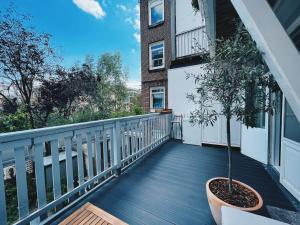 Spacious Designer Duplex next to Central Park