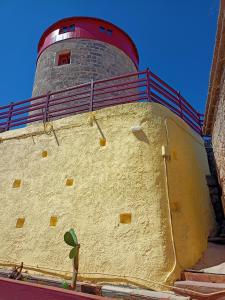 A medieval windmill tower in the heart of old town with magnificent view