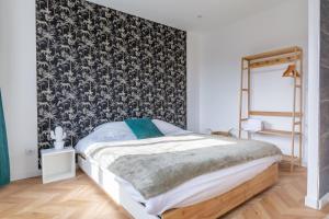 Appartements Le Longeville : photos des chambres