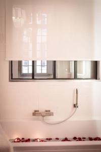 Appartements room five - parking, balneotherapie, place nationale, un havre de paix : photos des chambres