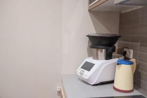 Appartements room five - parking, balneotherapie, place nationale, un havre de paix : photos des chambres