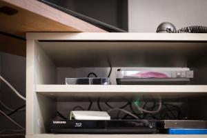 Appartements room five - parking, balneotherapie, place nationale, un havre de paix : photos des chambres