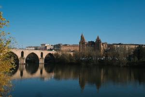 Appartements room five - parking, balneotherapie, place nationale, un havre de paix : photos des chambres