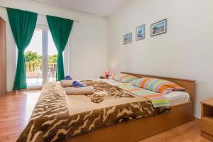 Two-Bedroom Apartment with Terrace room in Apartments by the sea Pirovac Sibenik - 6280