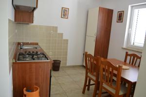 Apartments by the sea Kustici, Pag - 6408