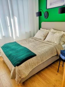 Zielony apartament z widokiem na jezioro