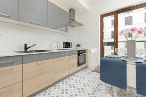 Warsaw Apartment Sierakowskiego by Noclegi Renters