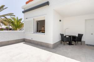 VILLA URBANIA Atico Deluxe By Sunkeyrents