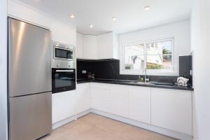 VILLA URBANIA Atico Deluxe By Sunkeyrents