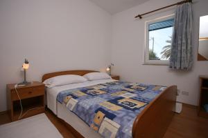 Two-Bedroom Apartment with Terrace and Sea View room in Apartment Stara Novalja 6301b