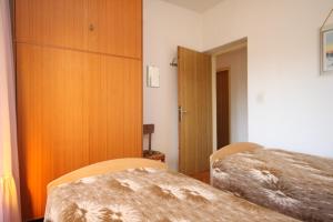 Apartments with a parking space Umag - 7066