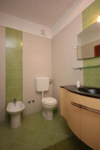 Apartments with a parking space Novigrad - 7142