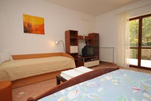 Family friendly apartments with a swimming pool Lindar, Central Istria - Sredisnja Istra - 7197