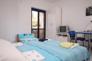 Apartments with parking space Fazana - 7234