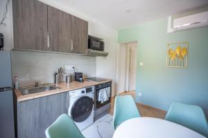 Appartements Capstay la Rhonelle - Netflix - 2 chambres - Cuisine : photos des chambres