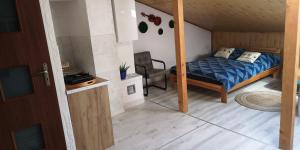 Apartament fort Owcza Góra na poddaszu