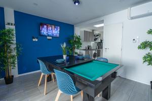 Appartements Capsule ocean - Jacuzzi - Billard - Netflix - 2 Chambres - Cuisine : photos des chambres