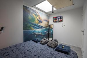 Appartements Capsule ocean - Jacuzzi - Billard - Netflix - 2 Chambres - Cuisine : photos des chambres