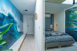 Appartements Capsule ocean - Jacuzzi - Billard - Netflix - 2 Chambres - Cuisine : photos des chambres