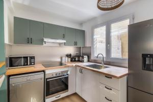 Villas Maison de ville en plein centre avec terrasse : photos des chambres