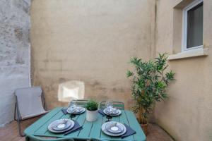 Villas Maison de ville en plein centre avec terrasse : photos des chambres