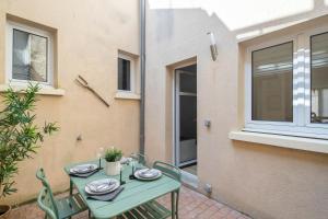 Villas Maison de ville en plein centre avec terrasse : photos des chambres