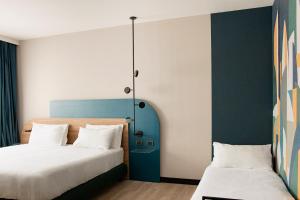 Superior Triple Room room in Holiday Inn Milan Assago
