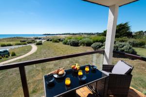 Appartements Appart' Cosy et balcon Face a l'Ocean par Groom* : photos des chambres