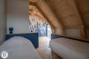 Chalets Les Burons du Mont-Dore : photos des chambres