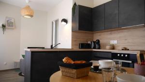 Appartements La parenthese du Tourmalet -draps inclus, local ski avec seche chaussures : photos des chambres