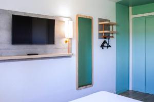 Hotels Ibis Budget Besancon Ouest : photos des chambres