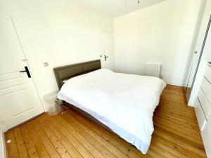 Villas Tres jolie Villa Bianca, maison avec jardin prive a Deauville : photos des chambres