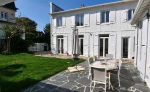 Villas Tres jolie Villa Bianca, maison avec jardin prive a Deauville : photos des chambres