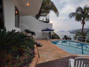 Conforto, Vista linda e Pé na Areia, Serviço de Praia Incluso