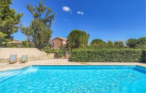 Maisons de vacances 3 Bedroom Nice Home In Fouzilhon : photos des chambres