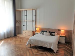 Appartements Meubles de l'Arsenal coeur de ville ! : photos des chambres