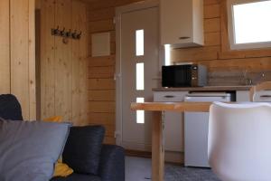 Appartements Tiny house dans jardin arbore : photos des chambres