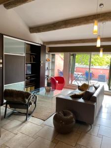 Appartements Le Loft DUPLEX, 2 Terrasses, au coeur du village : photos des chambres