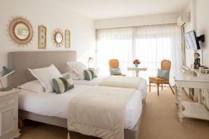 Hotels HOTEL LE CASTELLAN : photos des chambres