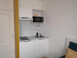 Appartements STUDIO COSY- CHALEUREUX- QUARTIER CALME- Wifi : photos des chambres