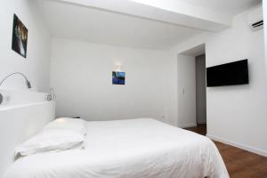 Les appartements quartier San Carlu, vieille ville Citadelle : photos des chambres