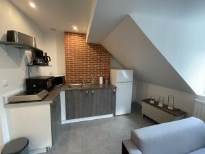 Appartements Le Mansard, atypique, gare et tramway 4min a pied : photos des chambres