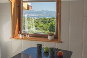 Casa con jardín y gran terraza con vistas al mar