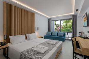 Superior Triple Room room in Oceanis Hotel