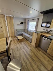 Campings MOBIL HOME XXL 3 chambres avec piscines partagees dans un camping-club vacances haut de gamme : photos des chambres