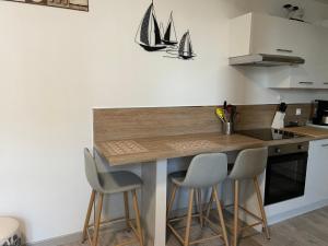 Appartements appartement sur digue avec parking interieur et wifi : photos des chambres