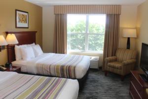 Queen Room with Two Queen Beds room in Country Inn & Suites by Radisson Crystal Lake IL
